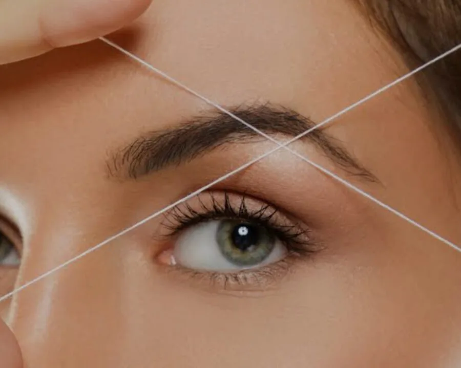 Eyebrow threading — cotton thread precision
