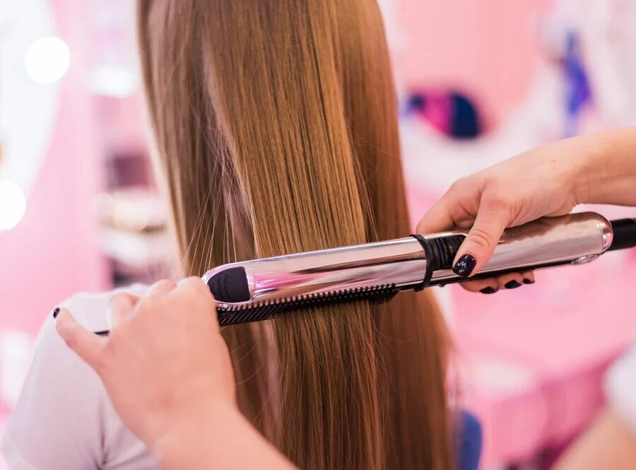 Hair straightening with flat iron